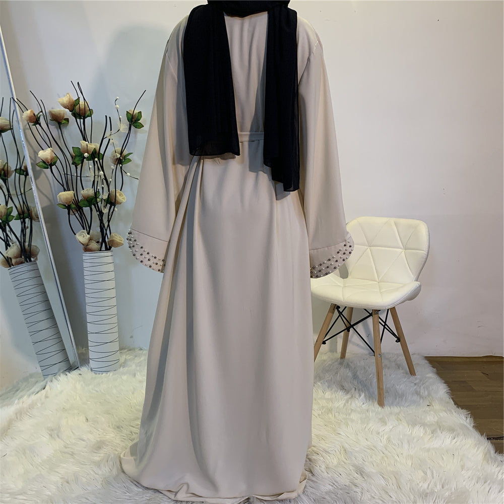 
                      
                        Malak Pearls Kimono
                      
                    