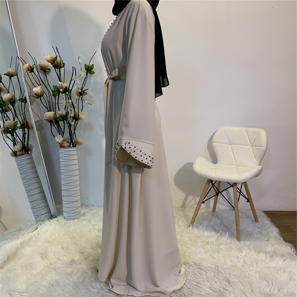 
                      
                        Malak Pearls Kimono
                      
                    