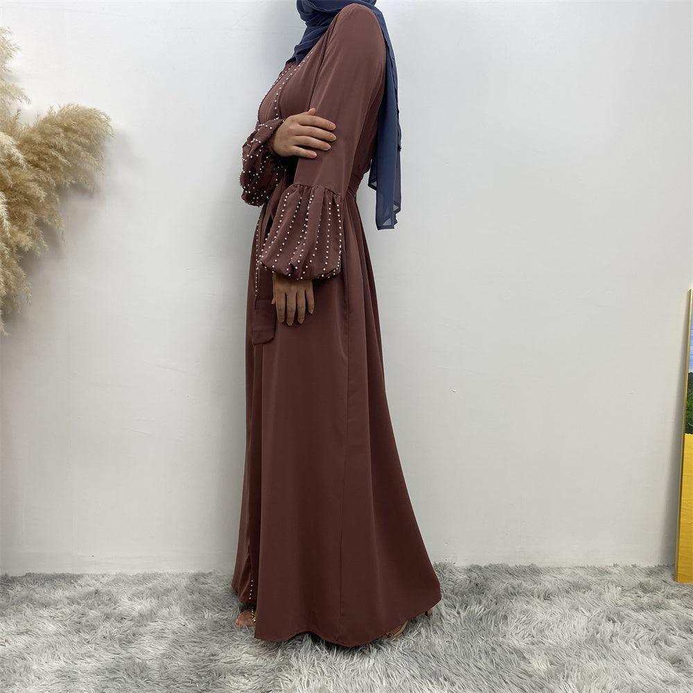 
                      
                        Pearls Luxe Nida Open Abaya
                      
                    