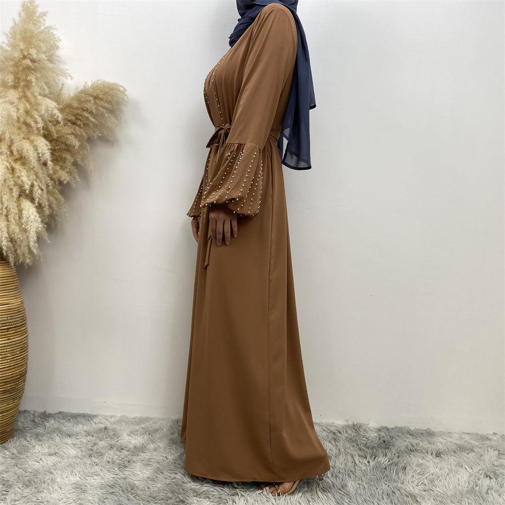 
                      
                        Pearls Luxe Nida Open Abaya
                      
                    