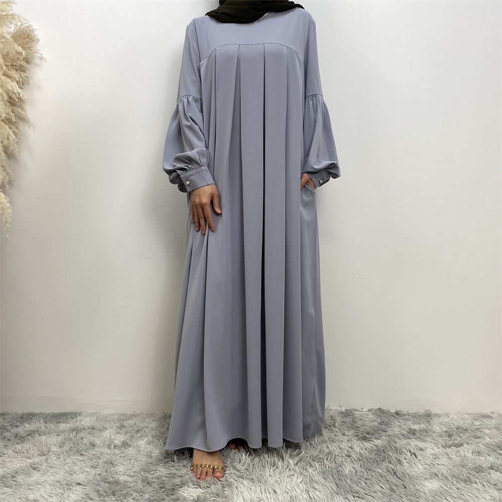 
                      
                        Safia Pleated Abaya
                      
                    