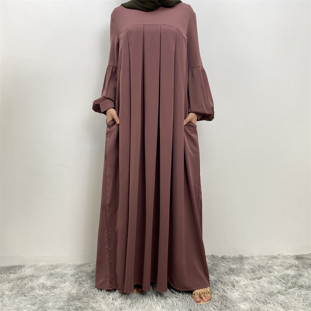 
                      
                        Safia Pleated Abaya
                      
                    